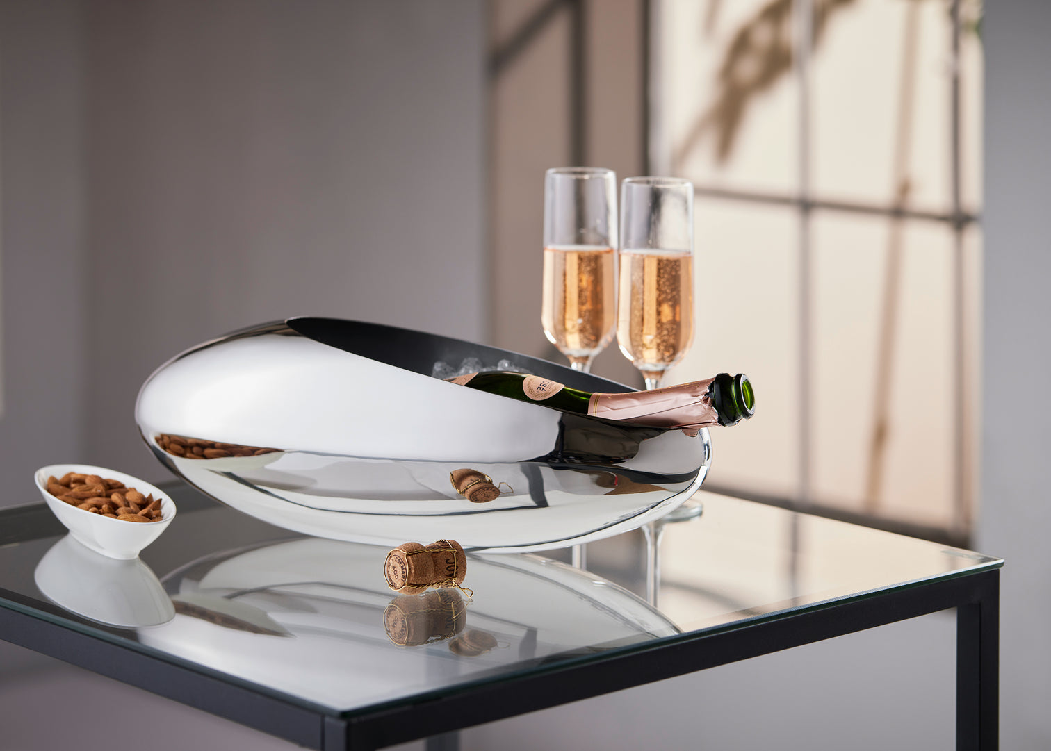 
Designer champagne cooler & tulip vase "Cocoon", highly polished stainless steel