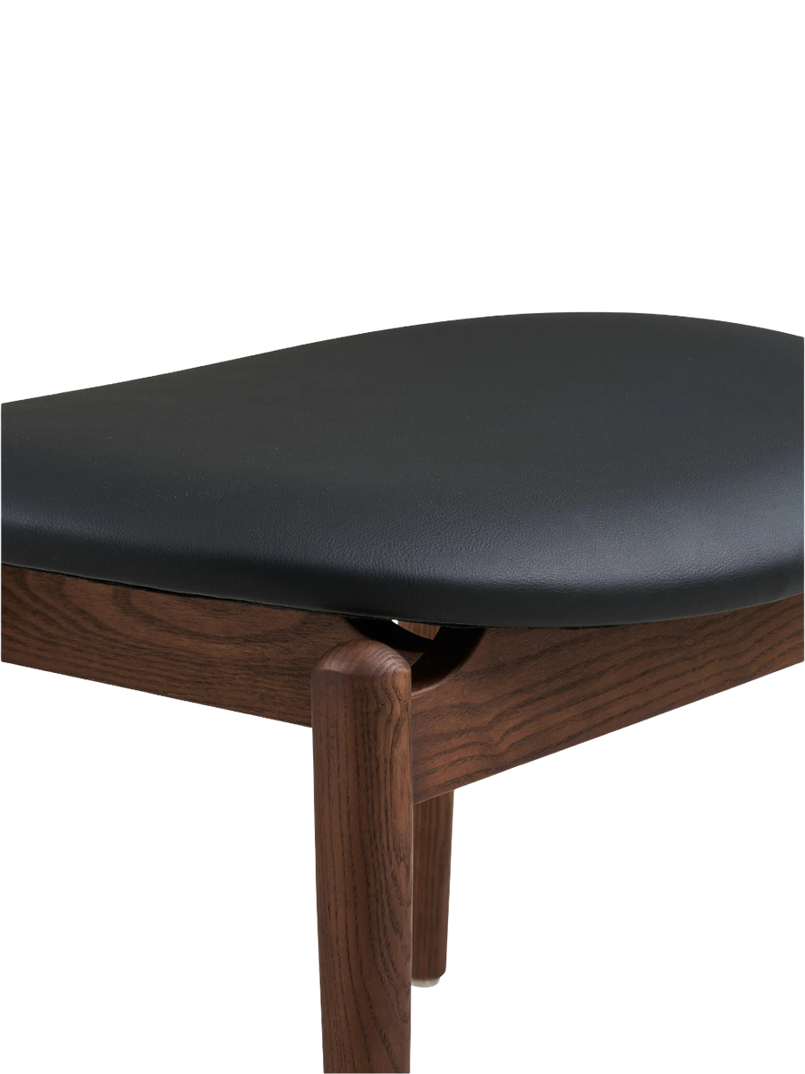 
Poltrona lounge di design in legno massello «Olvera» - con poggiapiedi / Noce / Nero