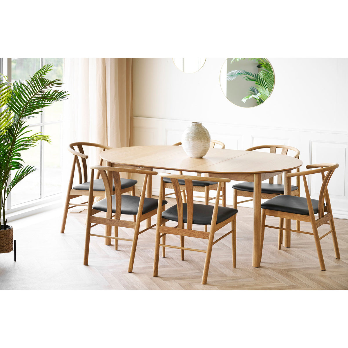 
Ausziehbarer Design Esstisch „Stella“ 120-220 x 120 cm - Eiche Natural