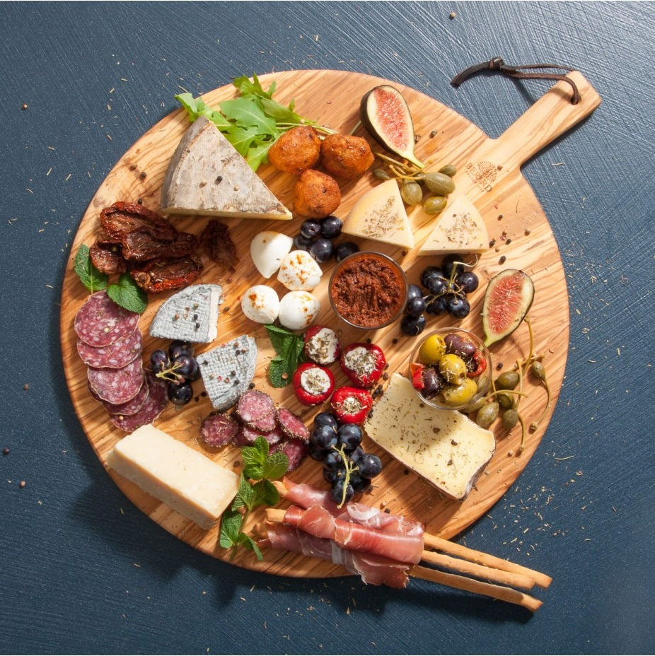 
Grande planche de service premium "Acero" en bois d'olivier, Ø 40 cm