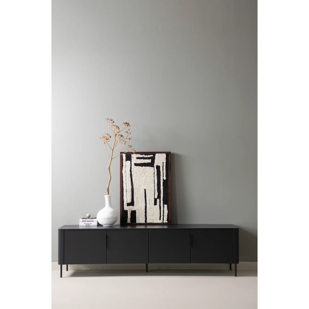 
4-türiges Design Lowboard „Gunaro“ aus nachhaltigem Massivholz - Schwarz matt