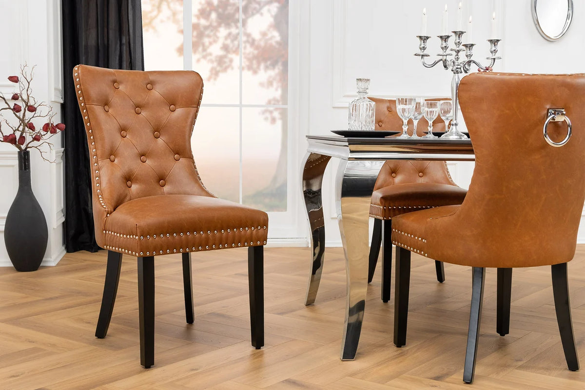 
Elegante sedia di design “Castle” con maniglia - similpelle cognac