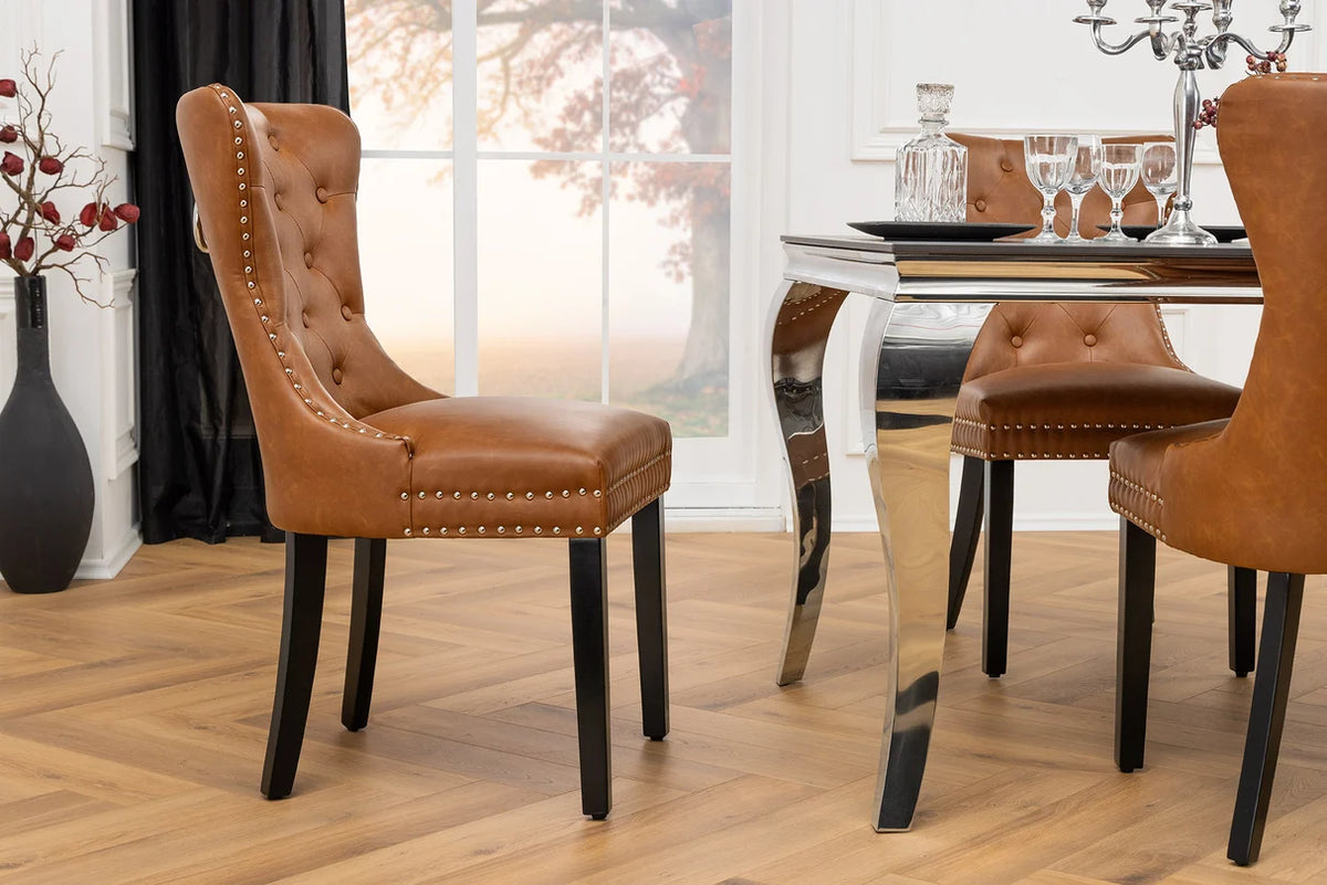 
Elegante sedia di design “Castle” con maniglia - similpelle cognac