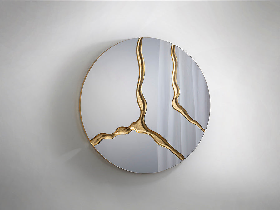 
Specchio rotondo da parete di design “Surcus” - Oro