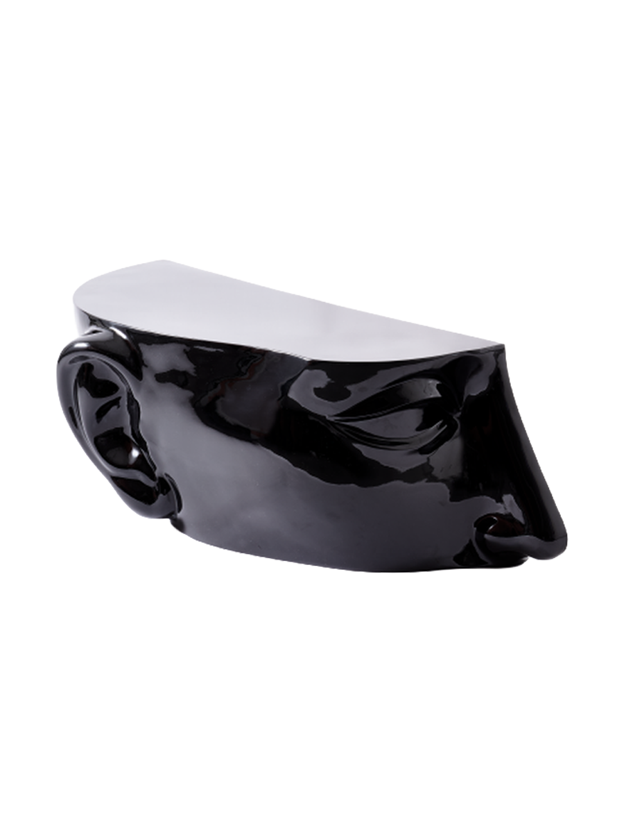 
Design Couchtisch „Head“ - Schwarz / linke Gesichtshälfte