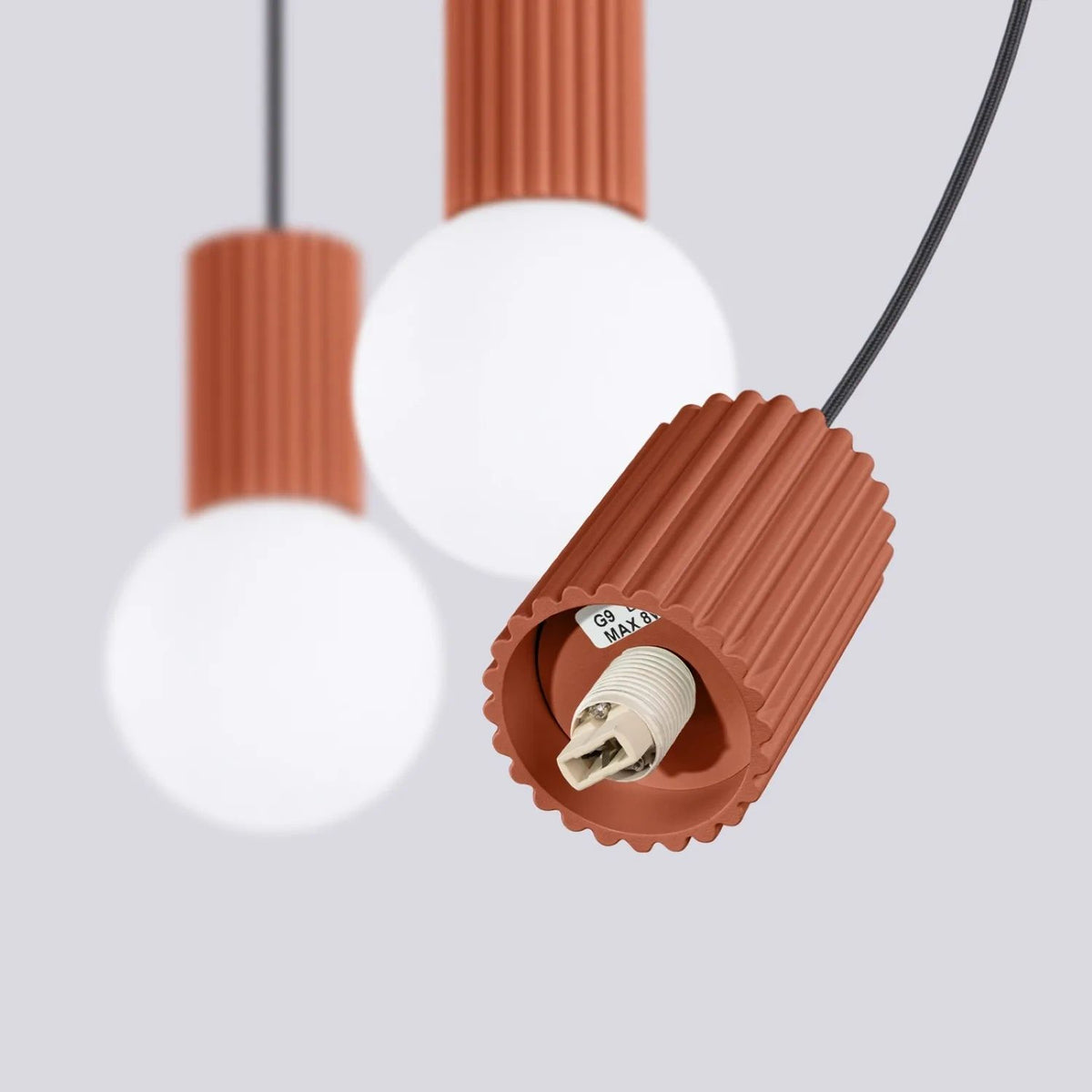 
Design Pendellampe „Halo II“, 3-flammig - Ockerrot