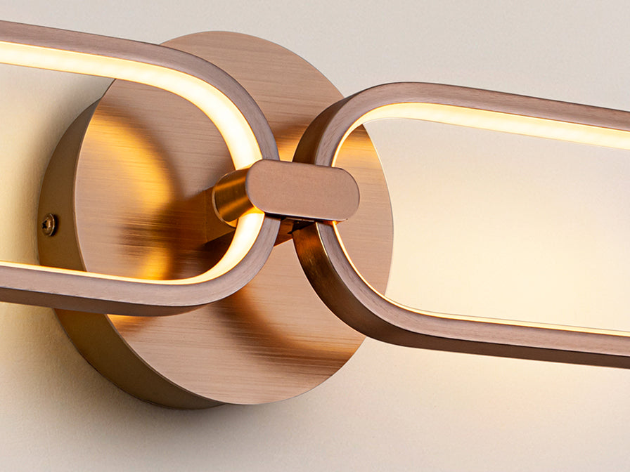 
Dimmable LED designer wall light “Colette”, rose gold