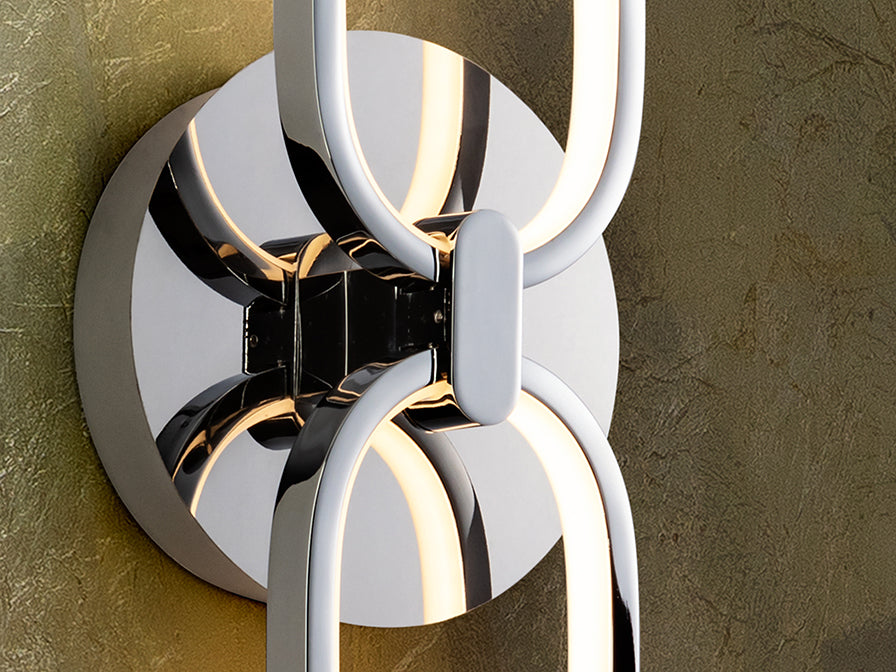 
Dimmable LED designer wall light “Colette”, chrome finish