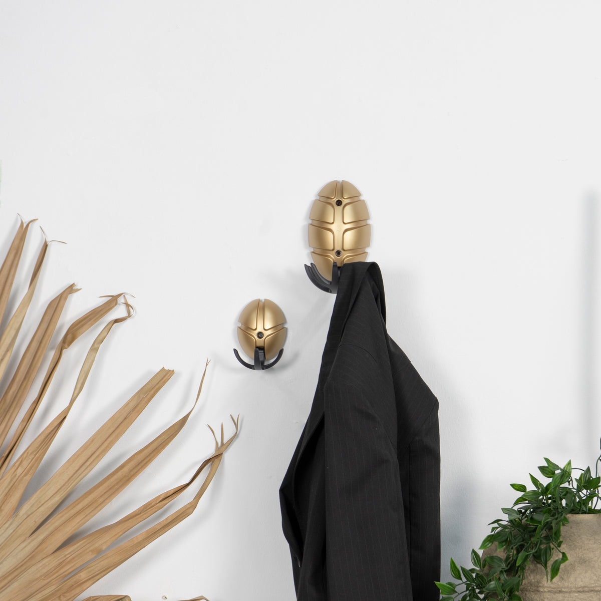 
Design Garderobenhaken „Tick“ - Gold/Schwarz