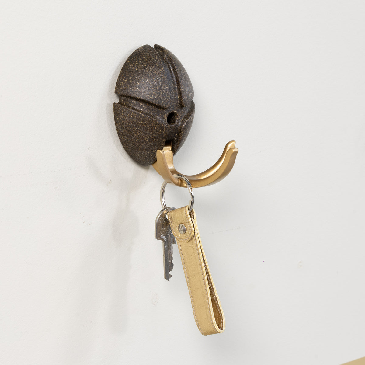 
Gancio appendiabiti di design “Tick Bio” - Oro