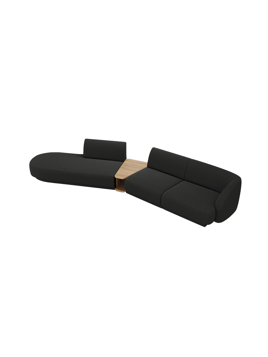 
Modulares Design Sofa „Miley“ mit Beistelltisch (4-Sitzer) - Bouclé Schwarz / Ottomane links