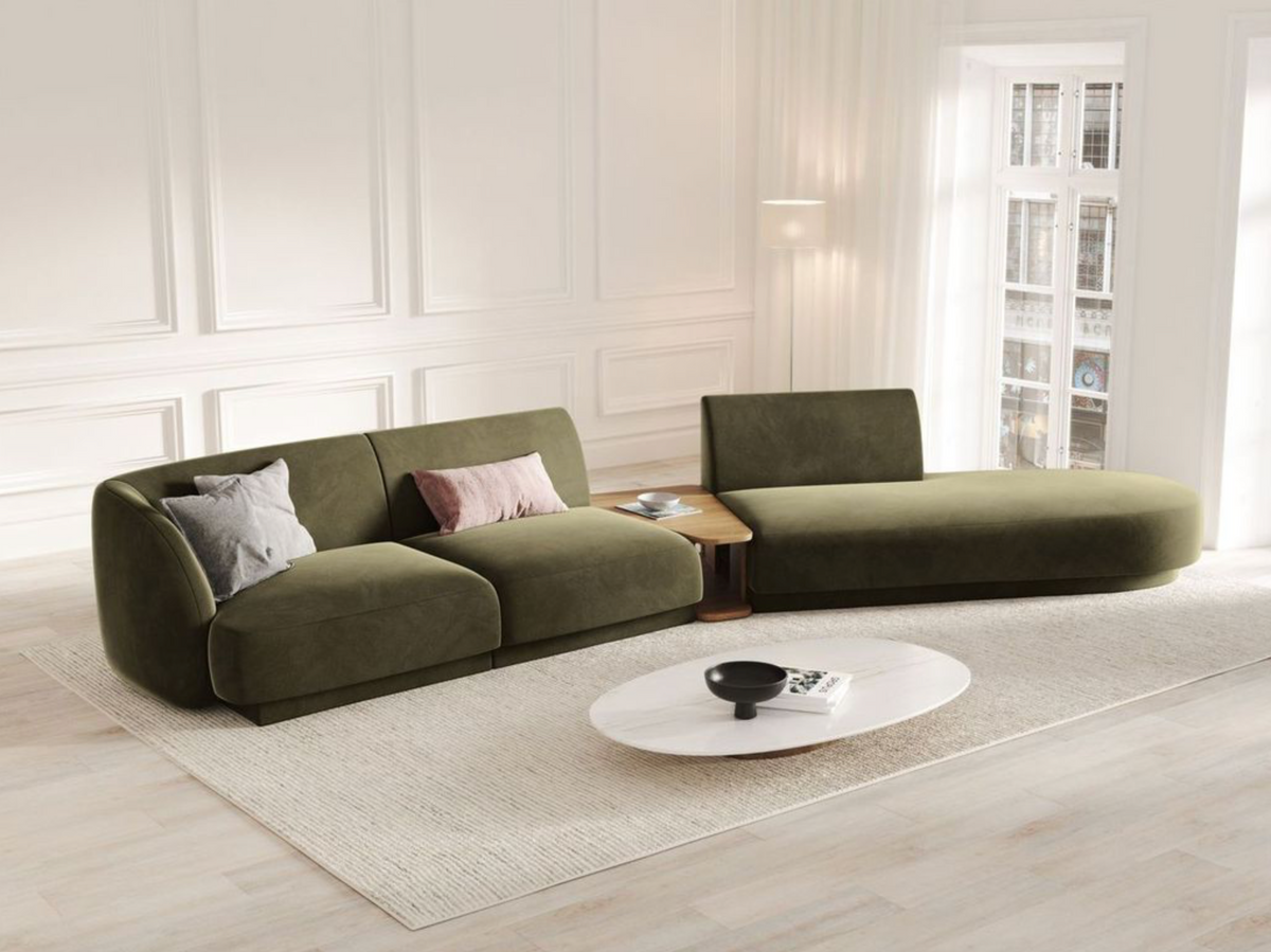 
Modulares Design Sofa „Miley“ mit Beistelltisch (4-Sitzer) - Samt Grün / Ottomane links