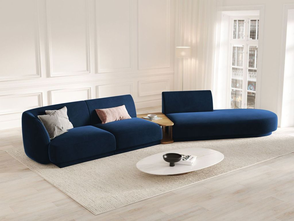 
Modulares Design Sofa „Miley“ mit Beistelltisch (4-Sitzer) - Samt Königsblau / Ottomane rechts
