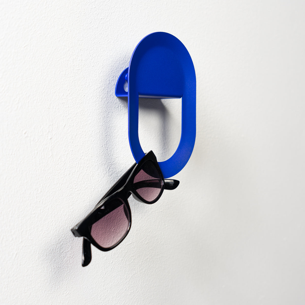 
Gancio da parete di design “Coucou” - Ultramarino